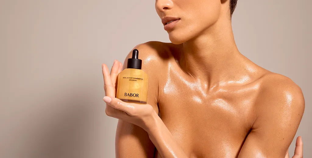 BABOR Soul & Body Shimmer Oil applied on skin – hydrating oil with subtle shimmer and natural glow