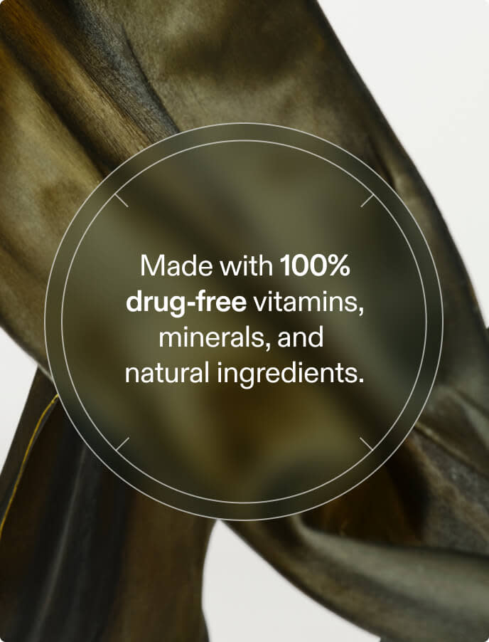 Close-up of 100% drug-free vitamins and natural botanical ingredients in Nutrafol Women's Balance for hormonal hair support.